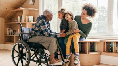 Grandson and grandmother holding hands during conversation