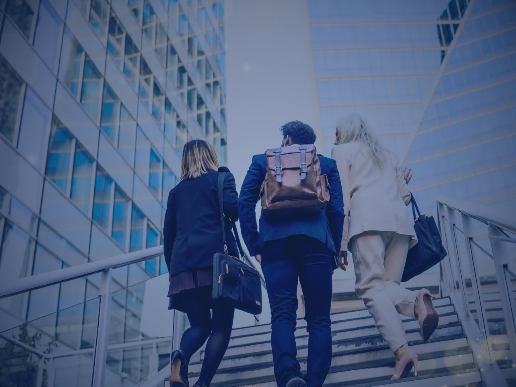 background image of professionals walking up steps